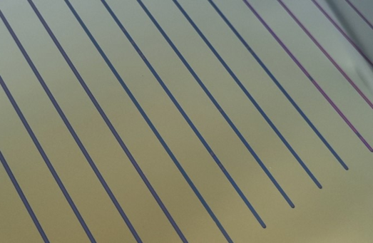 Printed graphene wires on wafer.