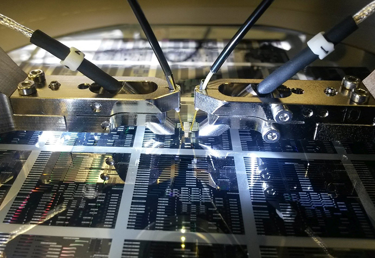 Measurement setup for optical characterization of wafer-level spectrometer components.