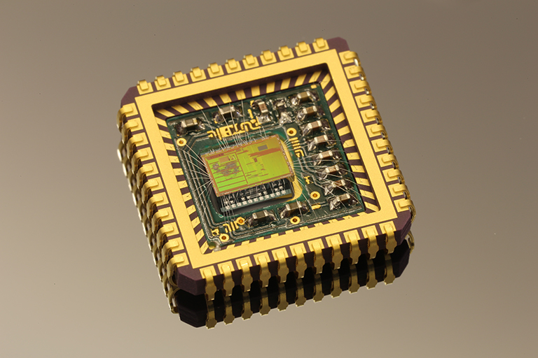 Angular rate sensor with MEMS, ASIC and discrete components in ceramic package.
