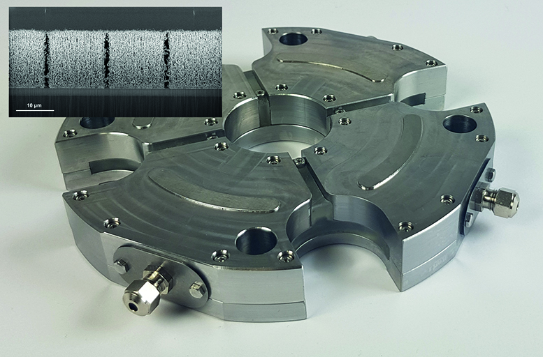 In cooperation with Fraunhofer IWU developed load cell with four sensor cells for process monitoring + SEM cross section image of the CNT network embedded in parylene.