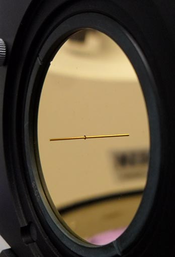 Photography of one of the reflectors with the axial coupling stub.